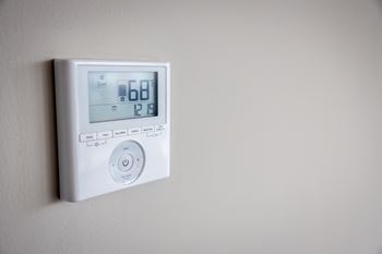 Modern finishes such as granite countertops and digital thermostats